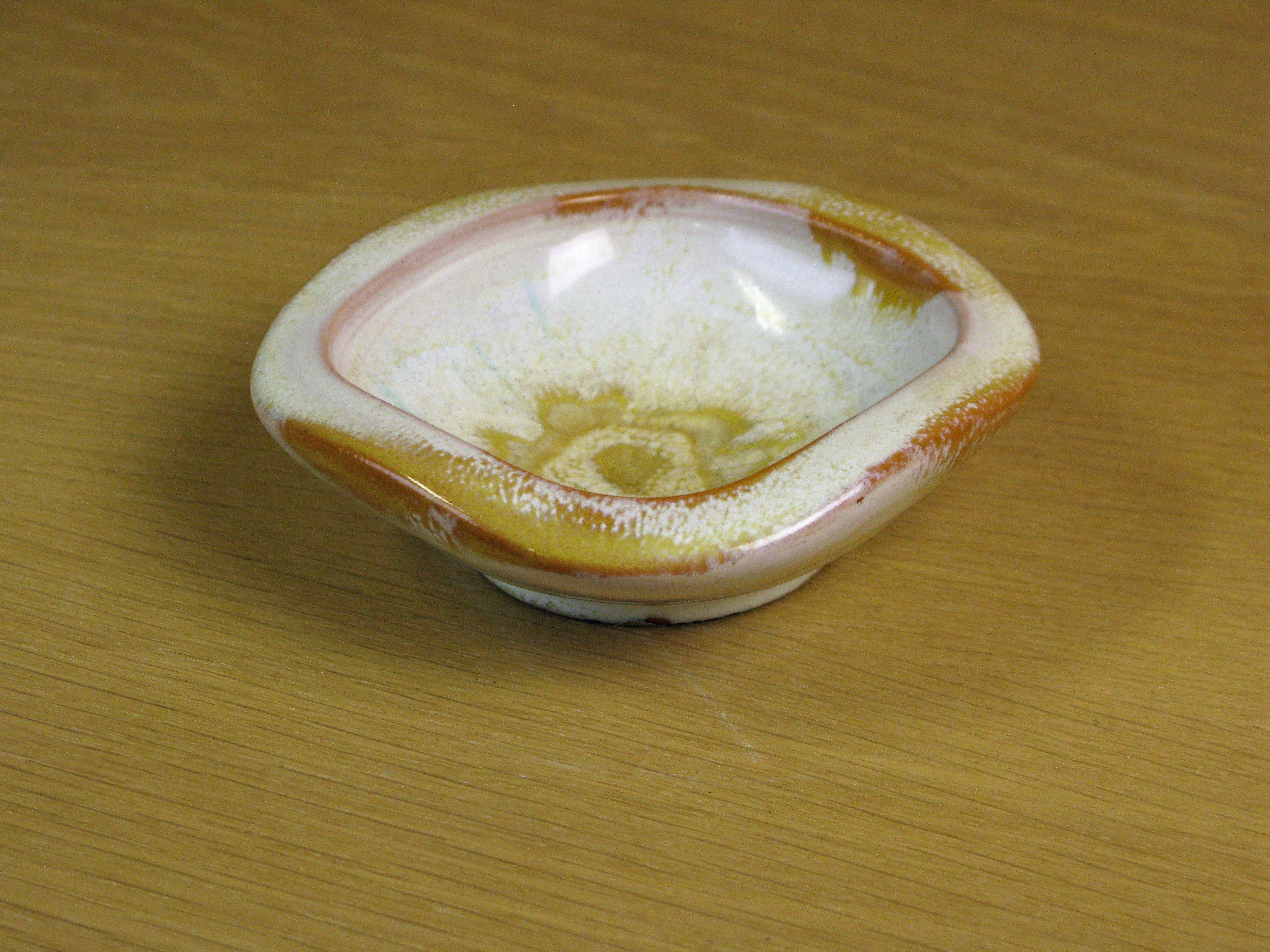 goldish ashtray 57