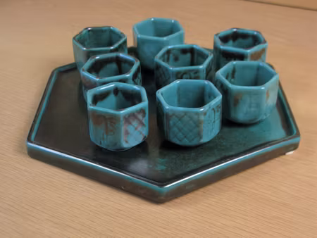 green cups on tray