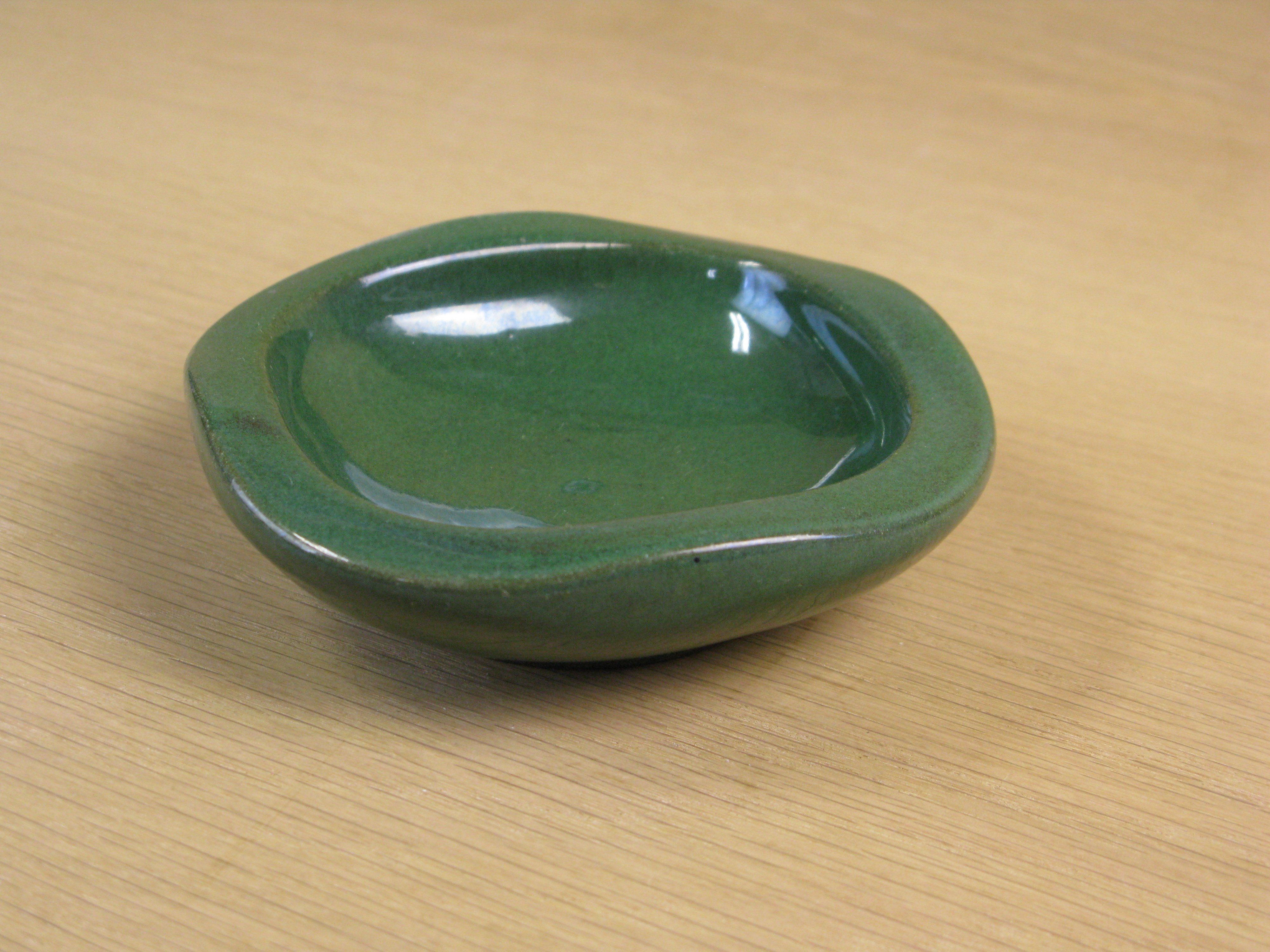 dark green ashtray 57