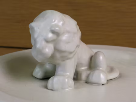 white lion in white ashtray 46