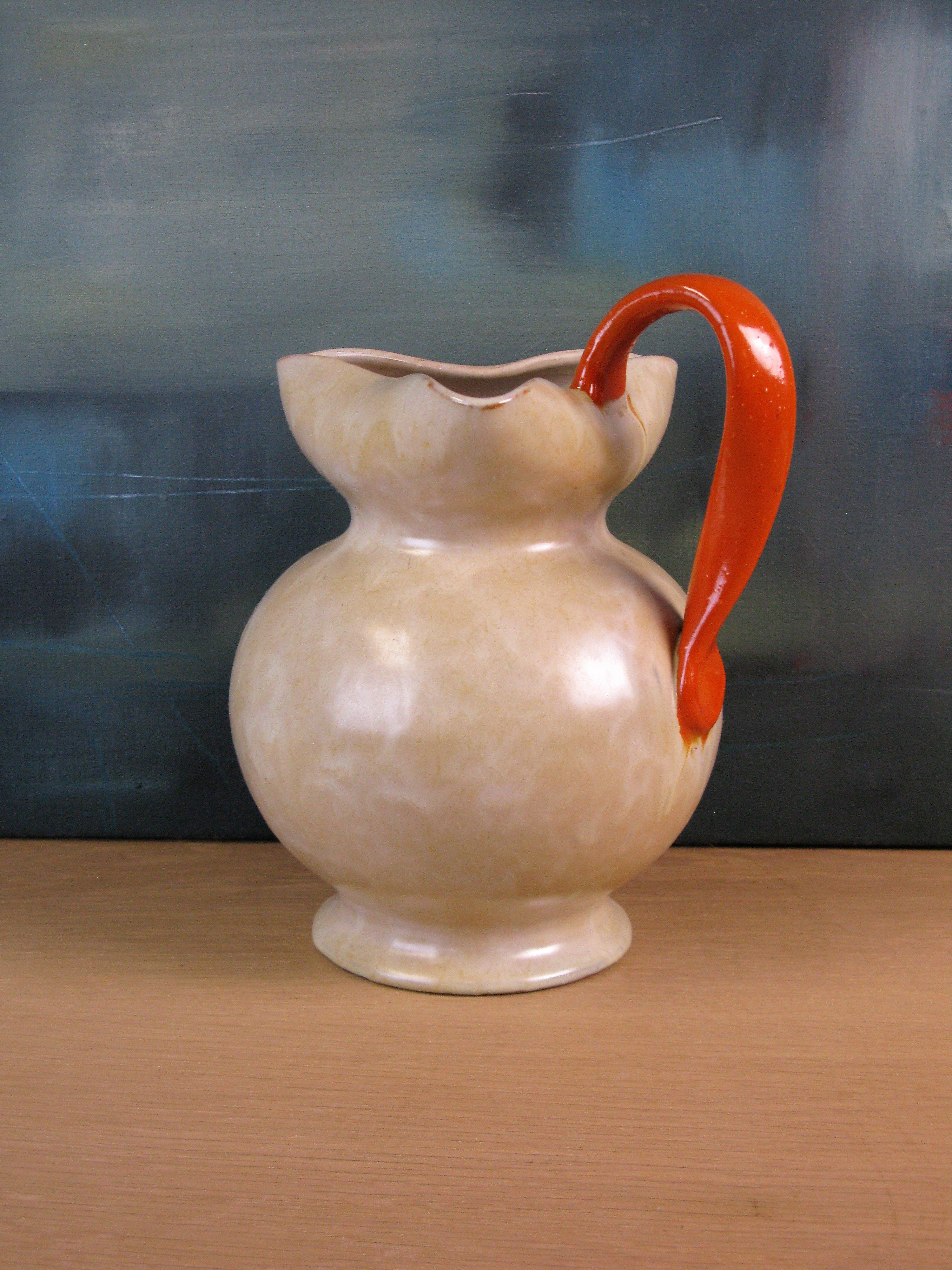 large yellowish/orange jug 2205