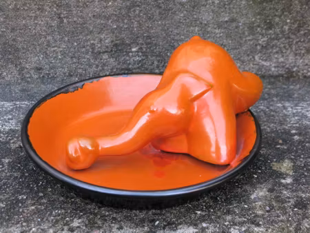 orange elephant in a bowl sold