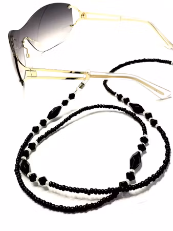 Snöre med svarta stenar