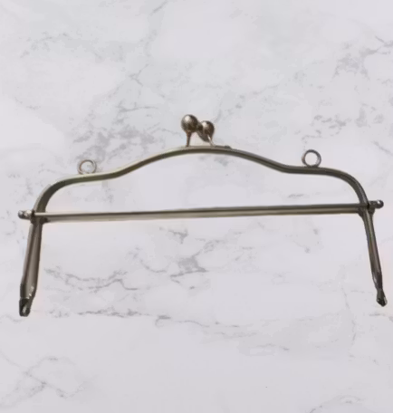 Väskbygel med handtag