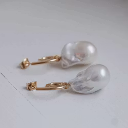 "Drop hoops" in gold with big white baroque freshwater pearl