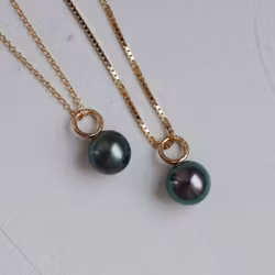 "Tahiti round" pendant in gold