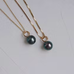 "Tahiti round" pendant in gold