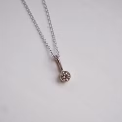 "Twinkle" pendant in white gold with a 0.15ct champagne diamond