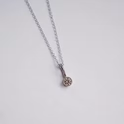 "Twinkle" pendant in white gold with a 0.15ct champagne diamond