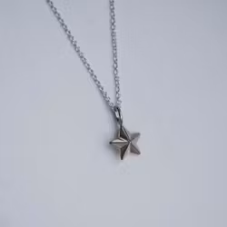 "Star" pendant in white gold