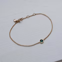 "Celestial" armband i guld med grön turmalin