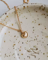 "Sigrid Heart" in 18K gold, chose gemstone & engraving