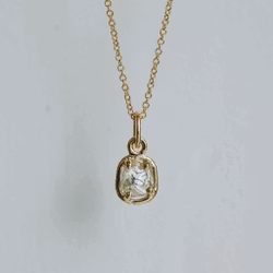 "Raw" pendant with a raw diamond