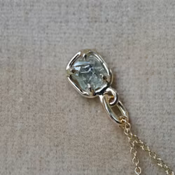 "Raw" pendant with a raw diamond