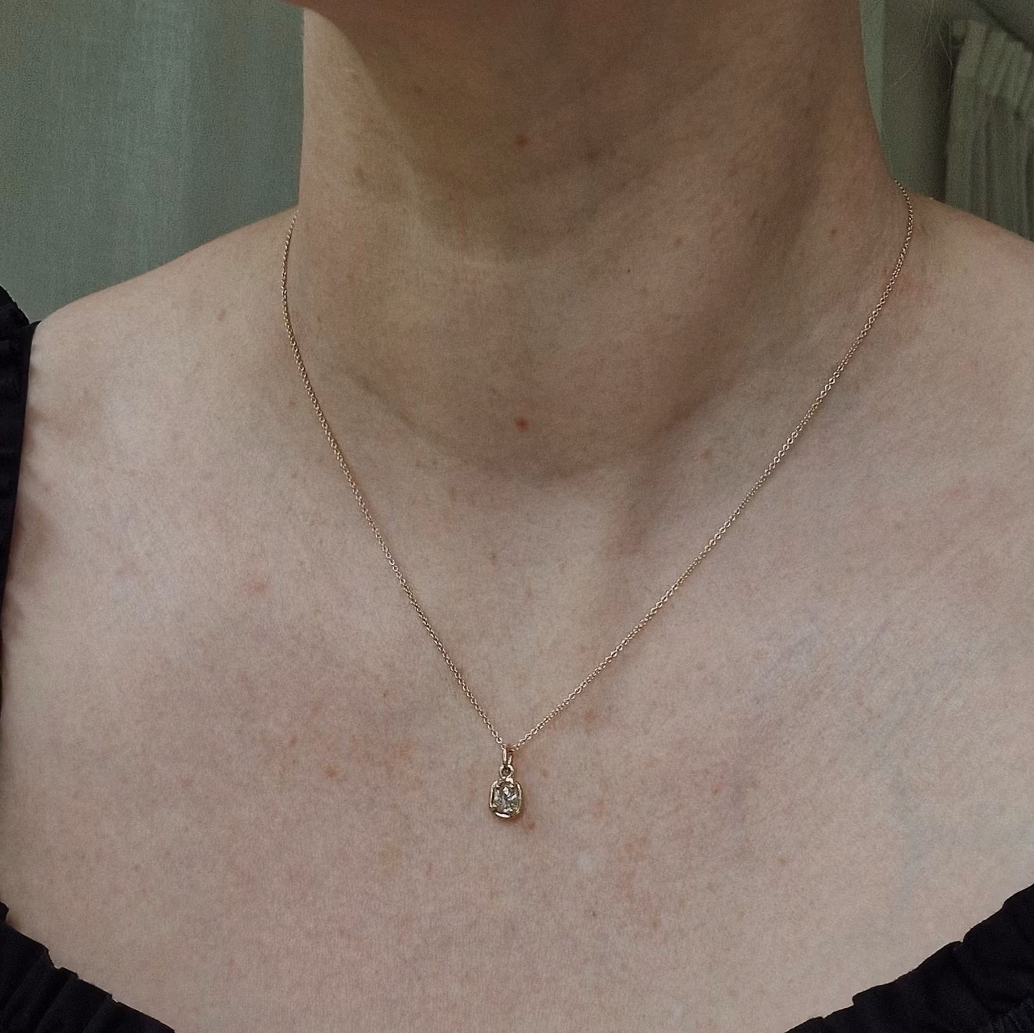 "Raw" pendant with a raw diamond