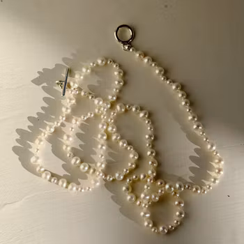 Collier med sötvattenspärlor 63cm