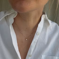 "Sirius" pendant in gold with an 0.24ct antique cut diamond