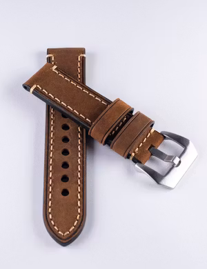 Brunt kraftigt klockarmband av läder med sömmar