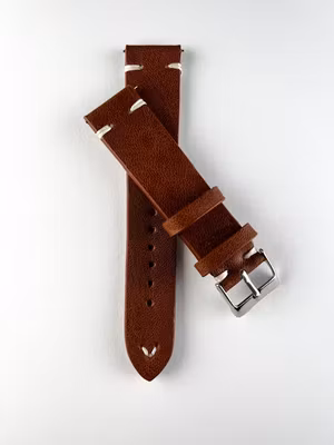 Brunt klockarmband av konstläder