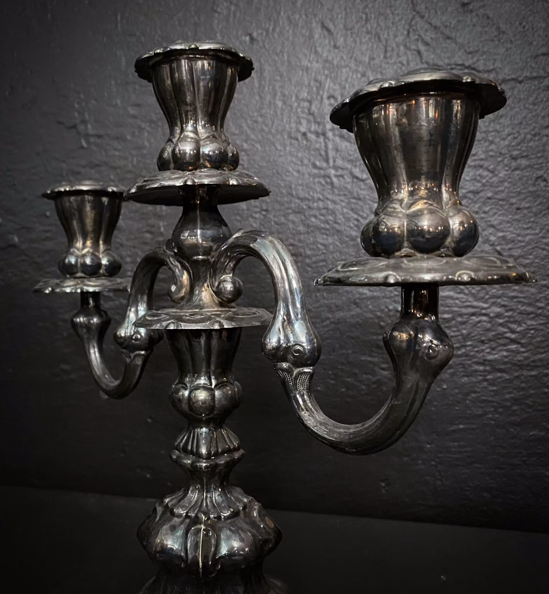 Three-armed candlestick silver