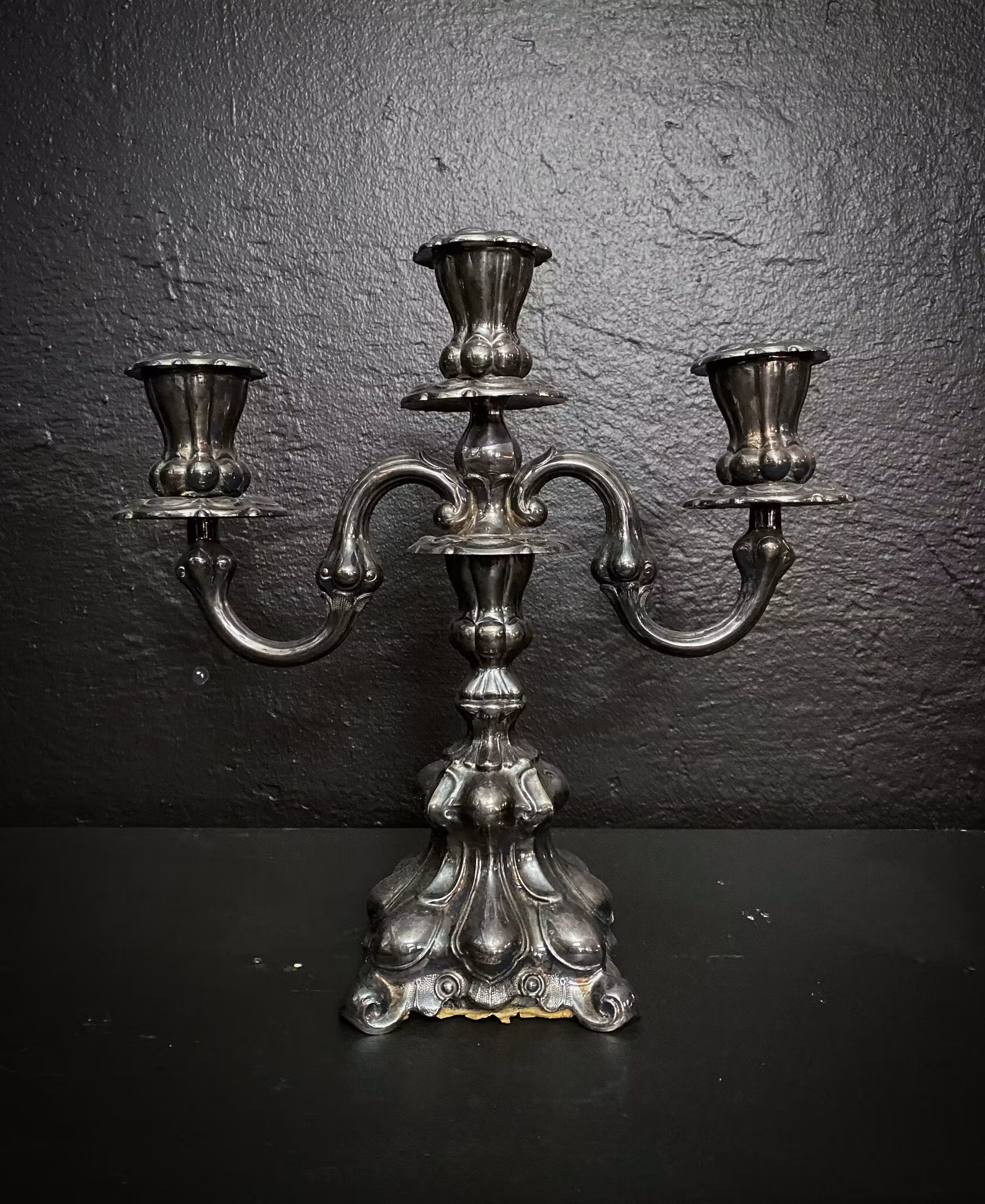 Three-armed candlestick silver