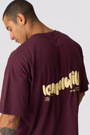 Oversized bomulls-T-shirt med tryck M Mörk mahogny