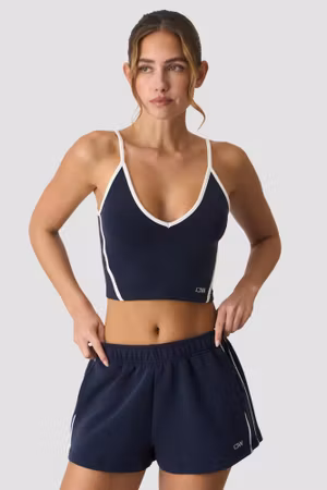 Kontrastfärgad V-ringad topp Midnattsblå