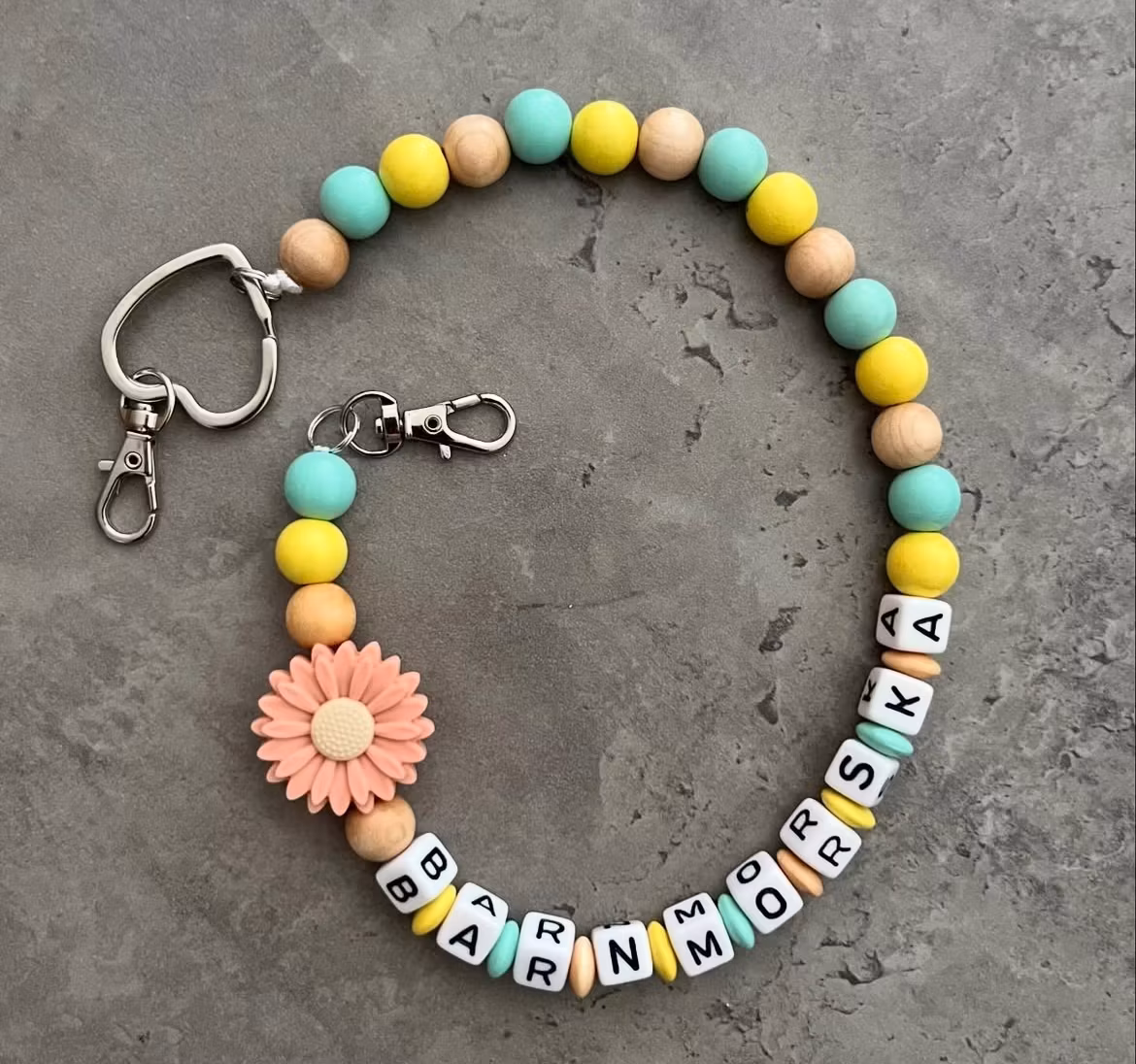 Nyckelkedja, persika blomma