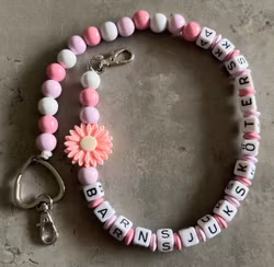 Nyckelkedja, rosa blomma