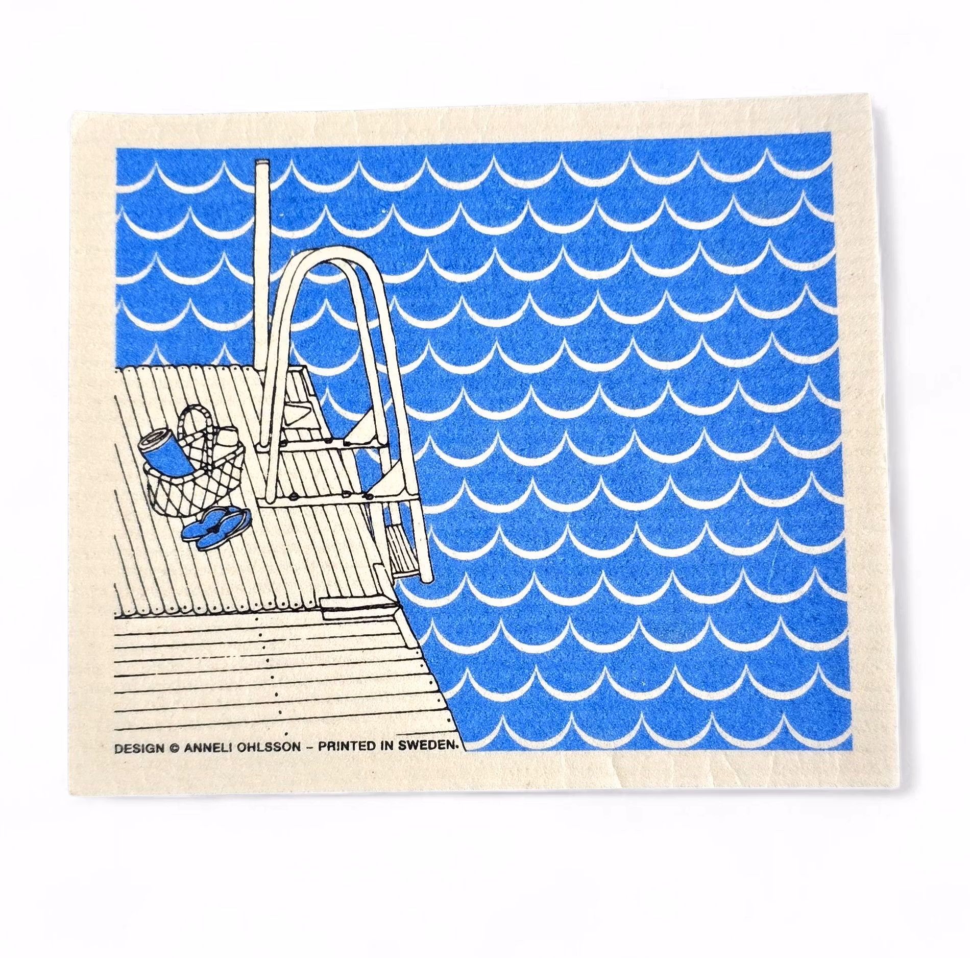 Disktrasan kvällsdopp, blå som matchar med handduken Brygghäng.