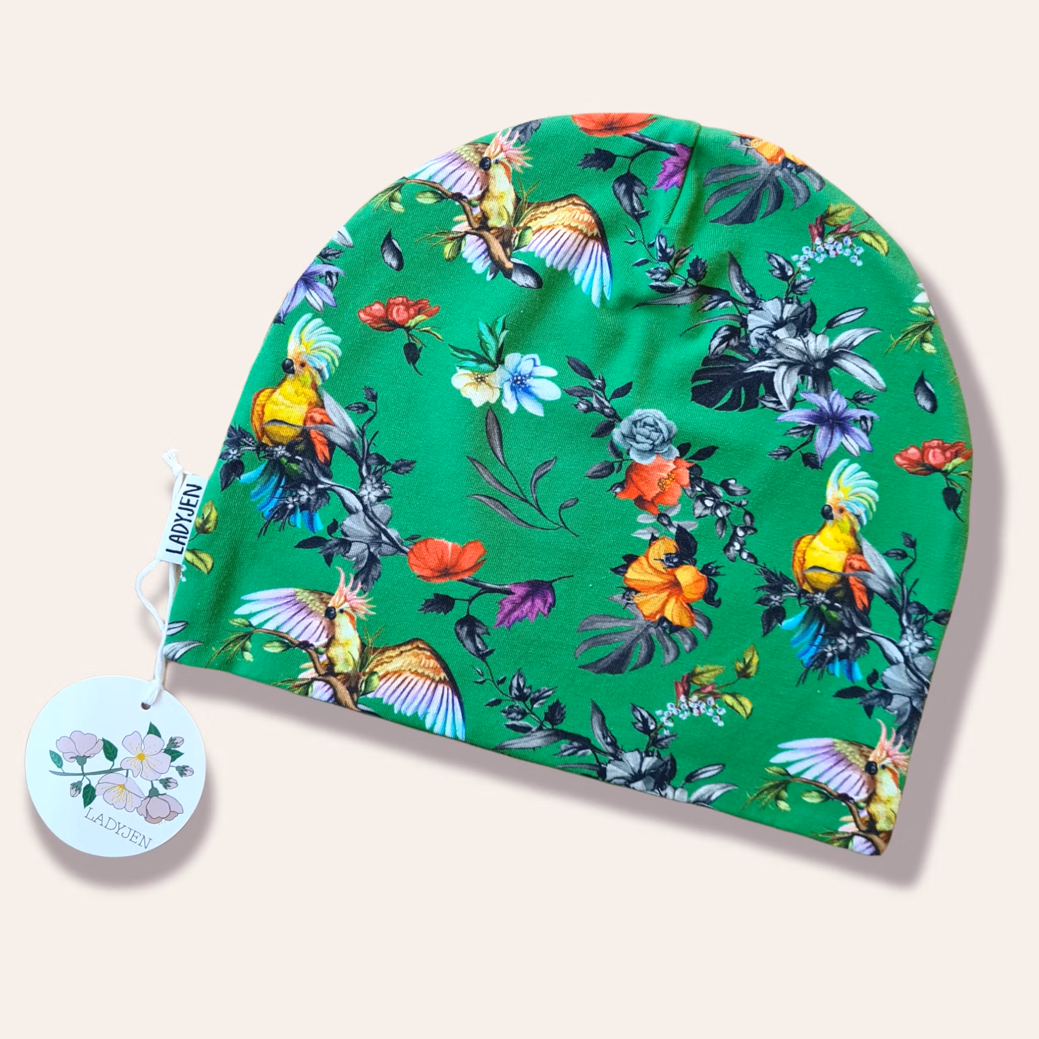 MÖSSA MED BLOMOR OCH PAPEGOJOR