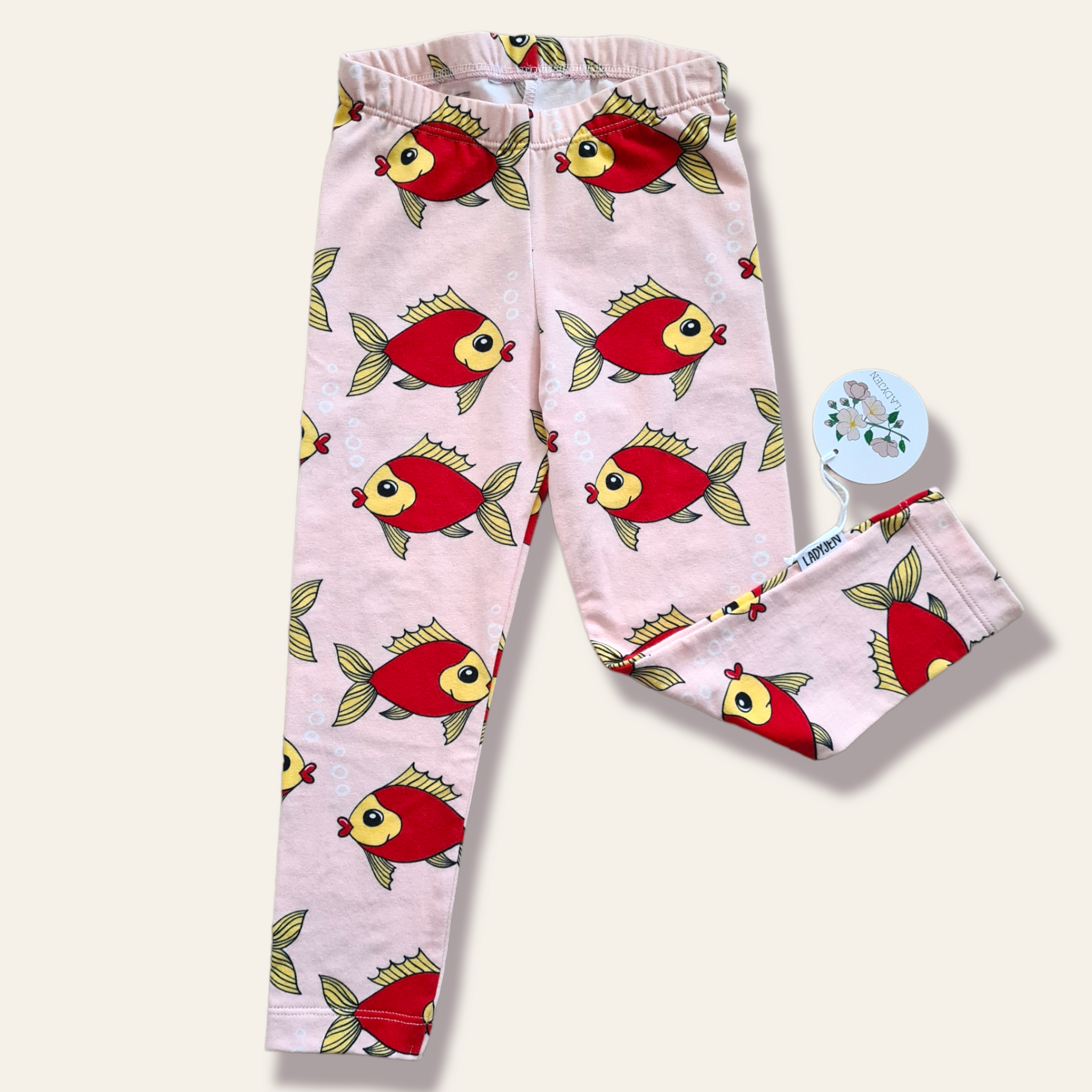 Ljusrosa leggings med fiskar