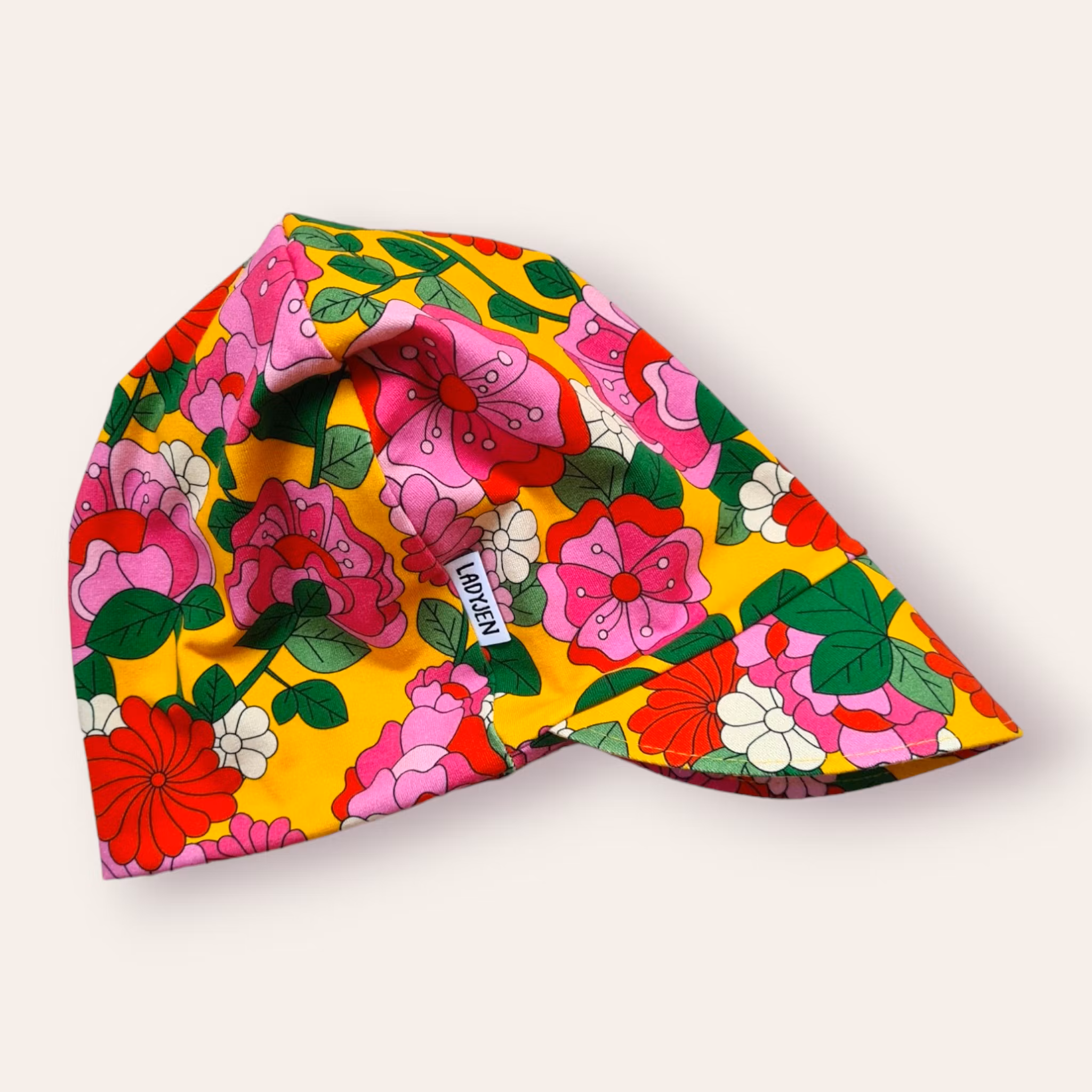 Meps - Gul med rosa blommor 52/54