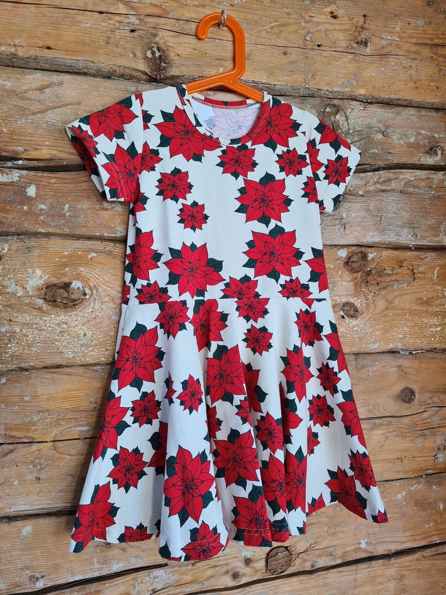 SNURRKLÄNNING - Julblomma