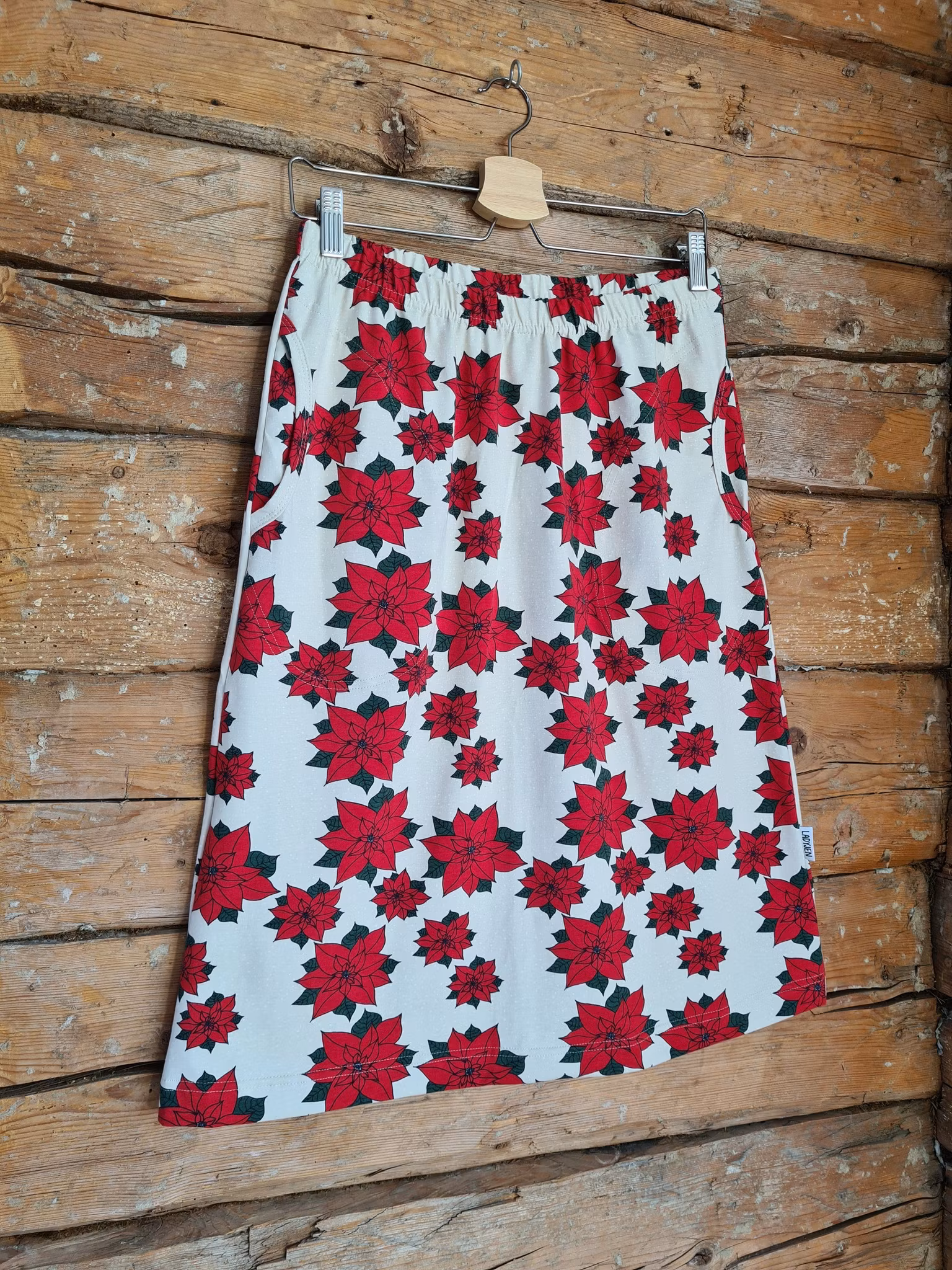 TRIKÅKJOL - JULBLOMMA