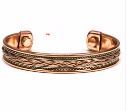 Armband i koppar med korsade band, magnetisk