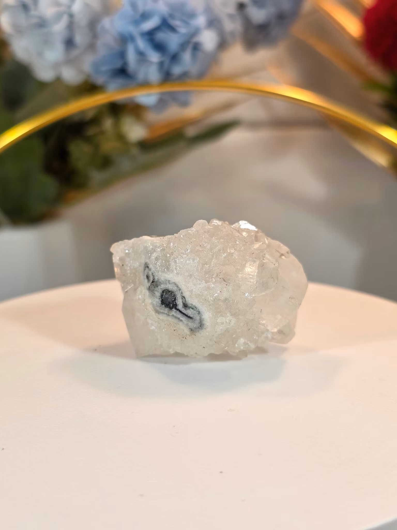 Apophyllite on quartz with visible stalactite structure and crystal formations