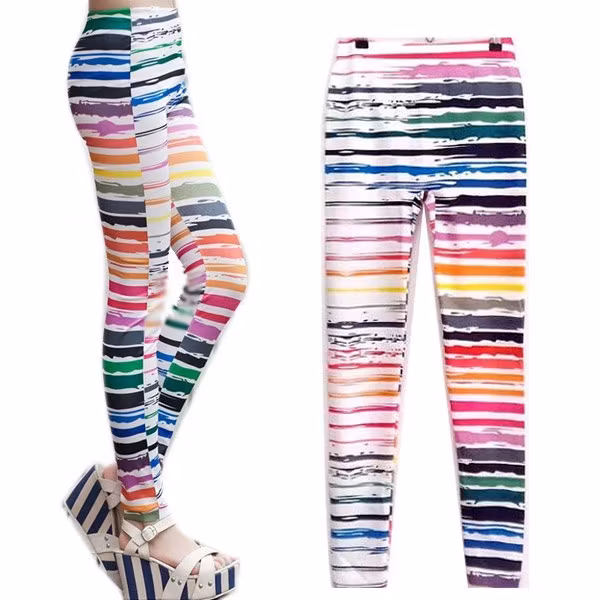 Vita leggings med färgglada ränder