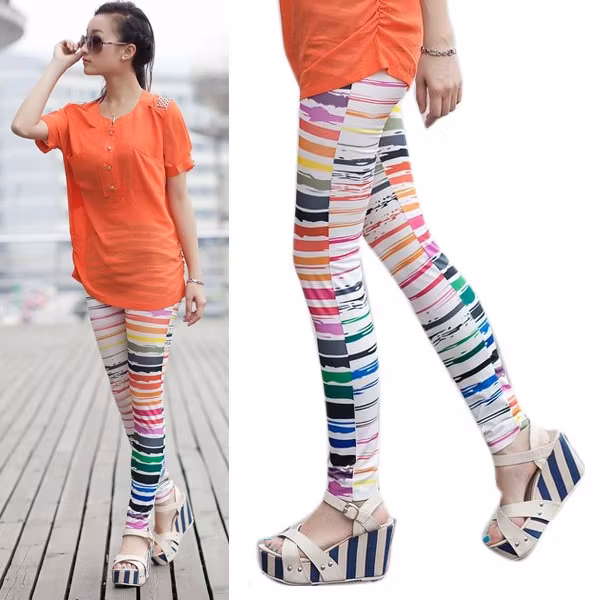 Vita leggings med färgglada ränder