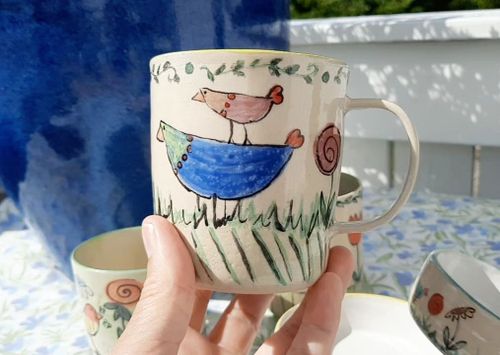 MUGG LEKFULLT DEKORERAD