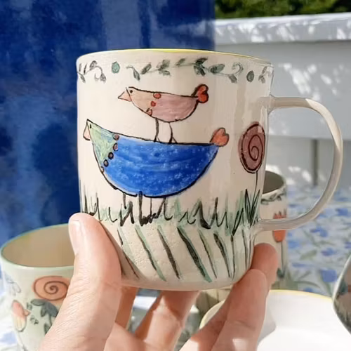 MUGG LEKFULLT DEKORERAD