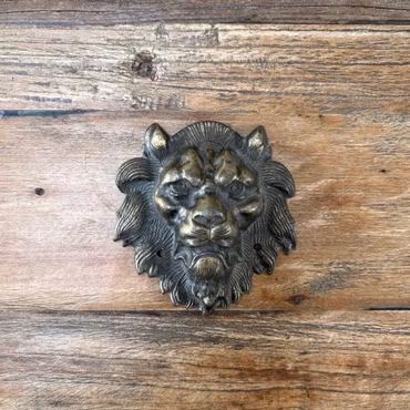 Vintage lejon väggdekoration i metall