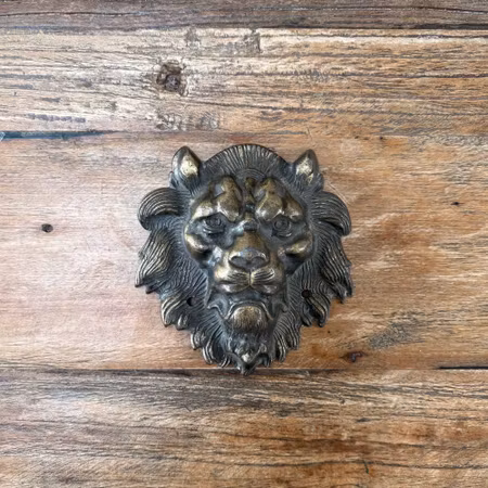 Vintage lejon väggdekoration i metall