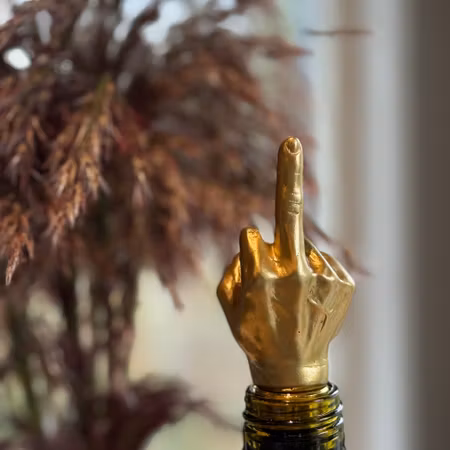 Flaskkork finger i guldfärg