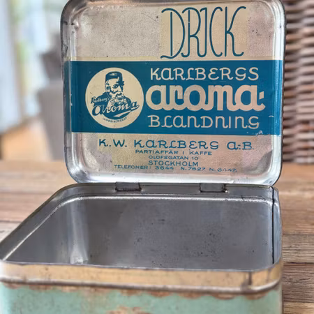 ”KWK” vintage plåtburk i turkos färg