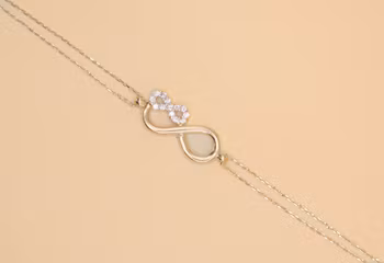 Armband med evigt Guld 18.0 cm