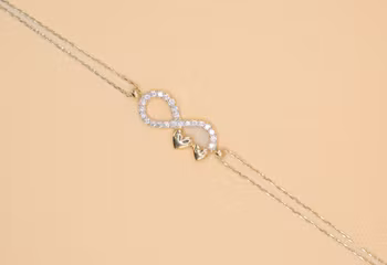 Armband med evigt Guld 18.0 cm