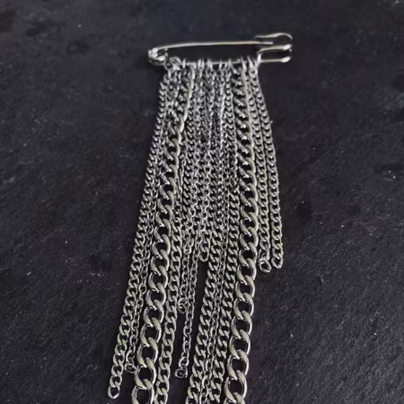 Riot Tassel Pin