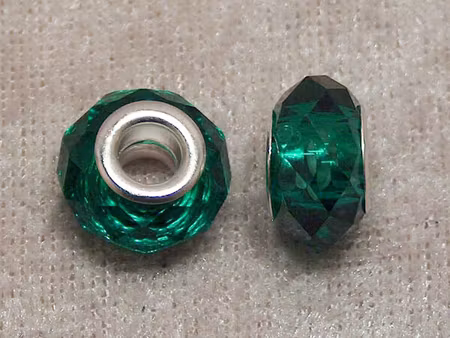 Fac. mörk tealfärgad glasrondell med stort silverfärgat hål