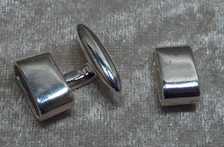 Lås/fäste för grövre remmar, ellips, ljus silver